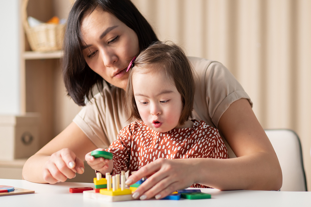 aba therapy new jersey virginia therapist working with child on learning activity by Empower ABA