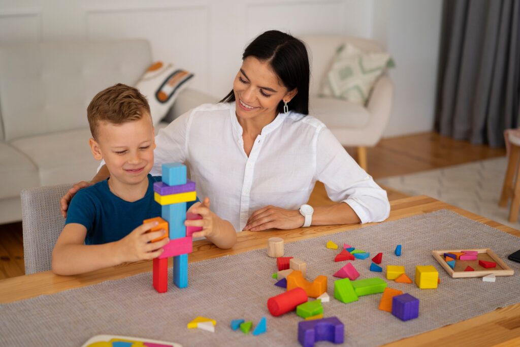 child with their mom playing brain teaser 3