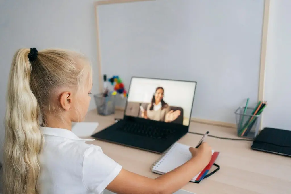 young girl paying attention online class 1